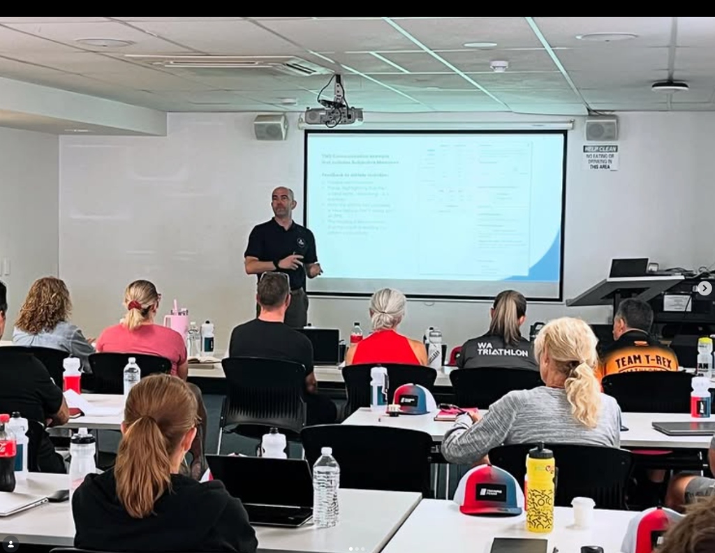 Leighton Wells speaking to a room of coaches at the AusTriathlon and TrainingPeaks workshop at the Queensland Academy of Sport.